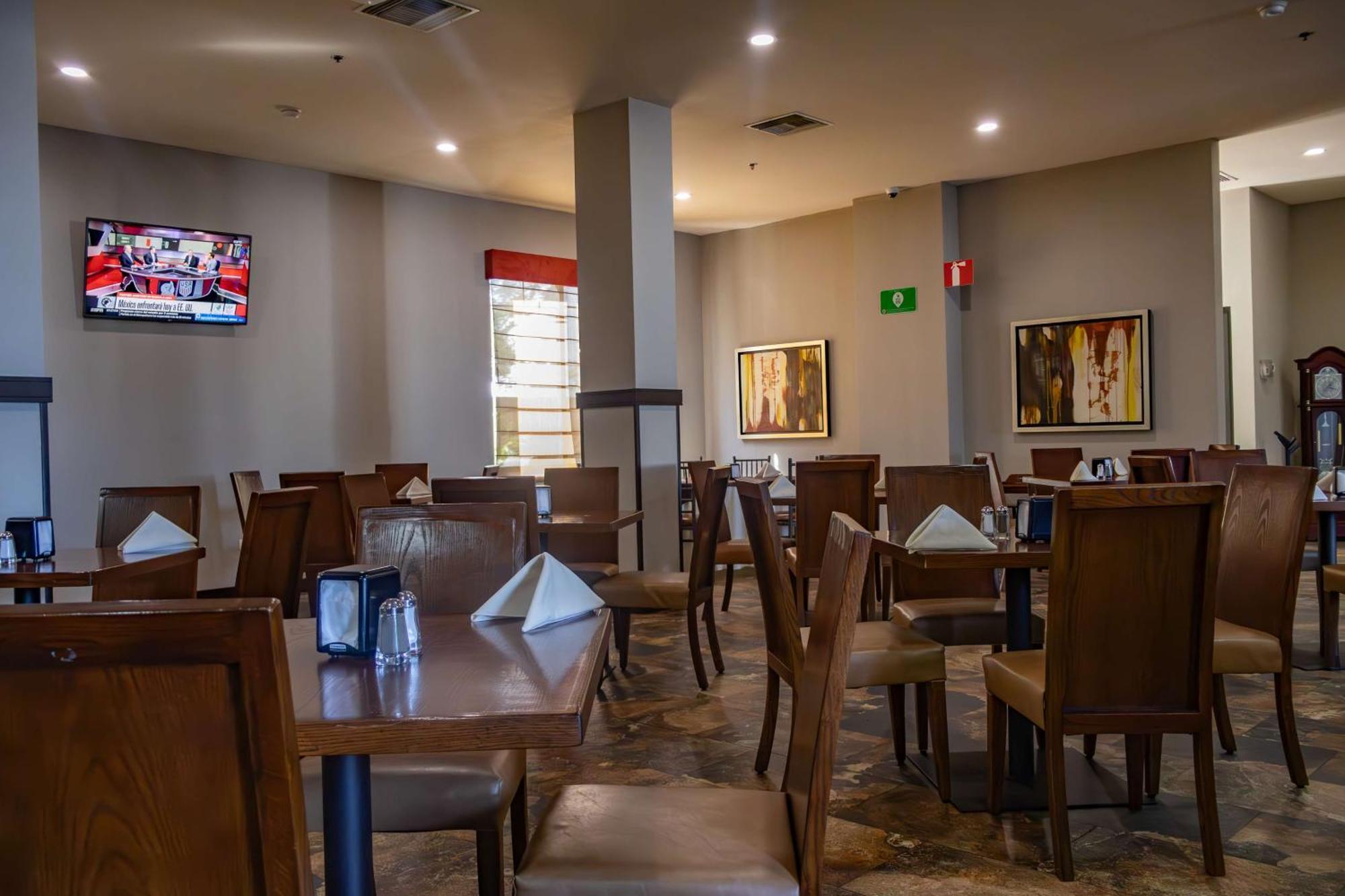 Best Western Premier Monterrey Aeropuerto Apodaca Exterior foto The dining room at the restaurant